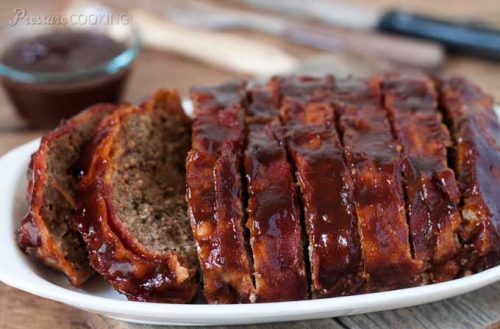 Pressure Cooker (Instant Pot) BBQ Bacon Meatloaf sliced on a serving platter and ready to serve.