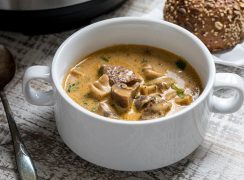 Pressure Cooker Beef and Mushroom Stew in a white bowl