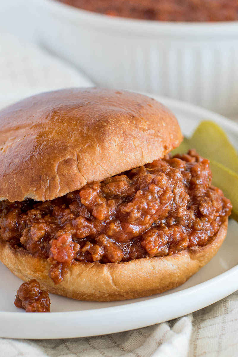 Close up shot of a Sloppy Joe made in an Instant Pot and served on a bun.