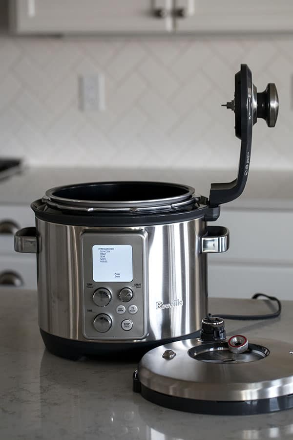 The arm on the Breville The Fast Slow Pro Pressure Cooker is not removable. 