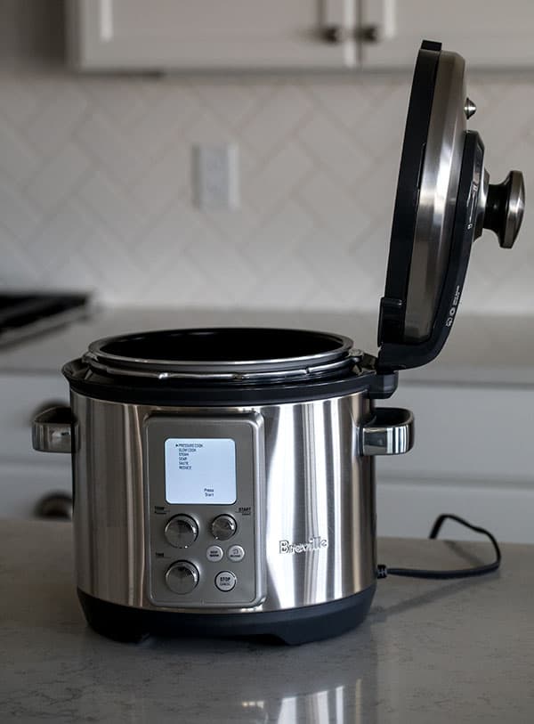 Breville The Fast Slow Pro Pressure Cooker lid opens to the side.
