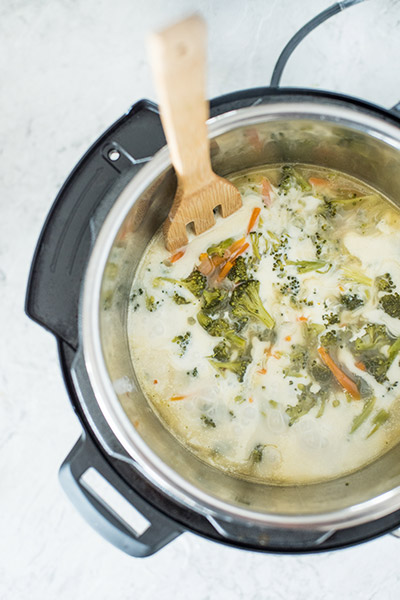 Cooked Instant Pot Broccoli Cheese Soup inside the cooking pot