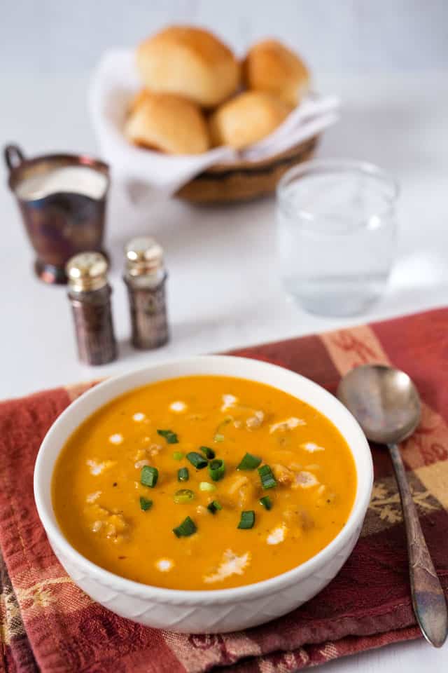 Smooth, creamy and delicious! The black and red pepper give this Pressure Cooker Butternut Squash Soup a little bit of heat and the half and half gives it great body and beautiful color.