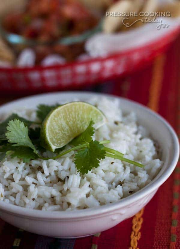 This Pressure Cooker Chipotle\'s Cilantro Lime Rice is perfect as a side dish with your favorite Mexican meal, or as the base of a burrito bowl the way they serve it at Chipolte\'s.