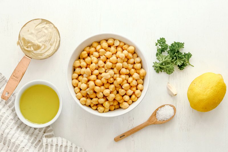 ingredients for classic hummus in bowls