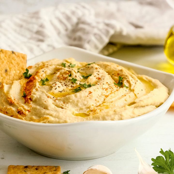 bowl of classic hummus with crackers