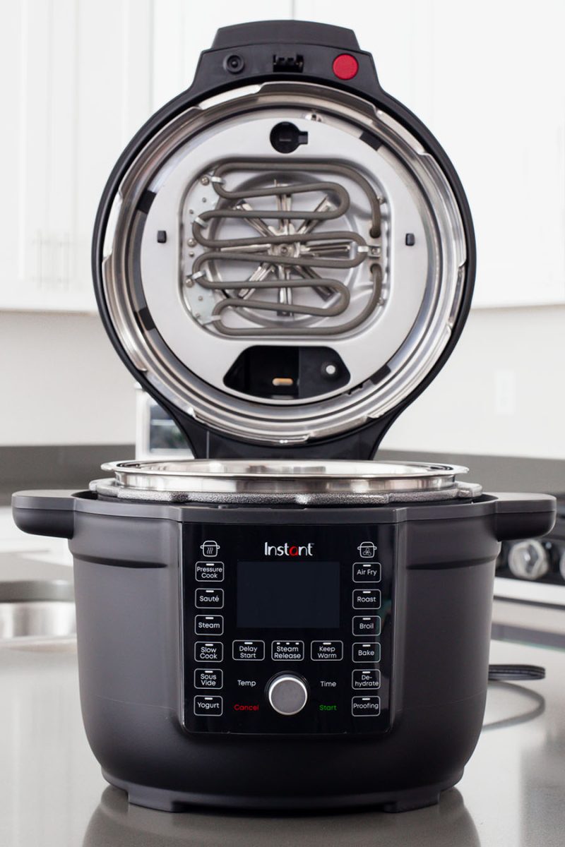 The front of the Instant Pot Duo Crisp with Ultimate Lid with the lid open showing the air frying lid.