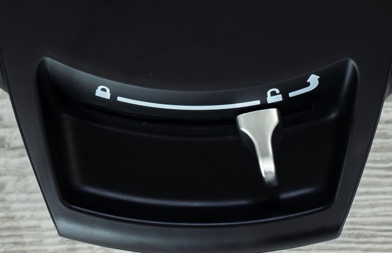 A close up of the Instant Pot Duo Crisp with Ultimate Lid showing the lid lock switch.
