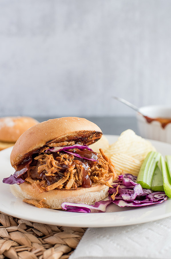 Pressure Cooker Easy Pulled Pork sandwich, with cabbage, celery, and potato chips