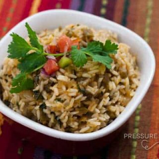 Pressure Cooker (Instant Pot) Green Chile Lime Salsa Rice in a white bowl