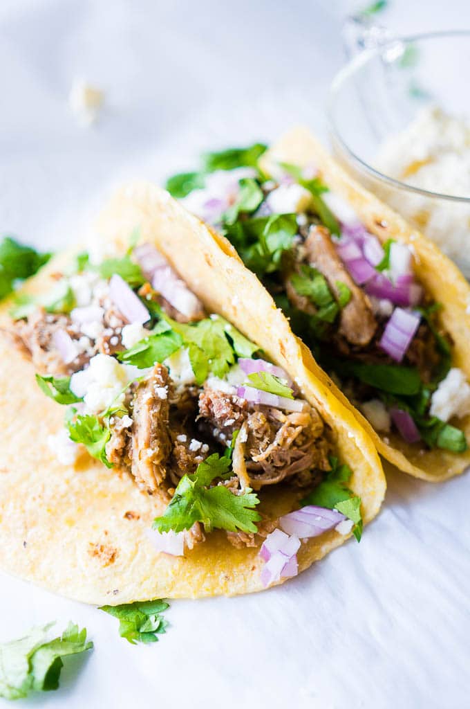 Pressure Cooker Green Chile Pork Carnitas. Moist, flavor-packed, and fall apart in your mouth tender, these green chili pork carnitas tacos are the perfect solution for a speedy family friendly dinner!
