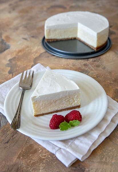 Pressure Cooker Hollywood Two-Tone Cheesecake is a very simple, classic cheesecake—just cream cheese, eggs, sugar and vanilla—dressed up with a sour cream topping.