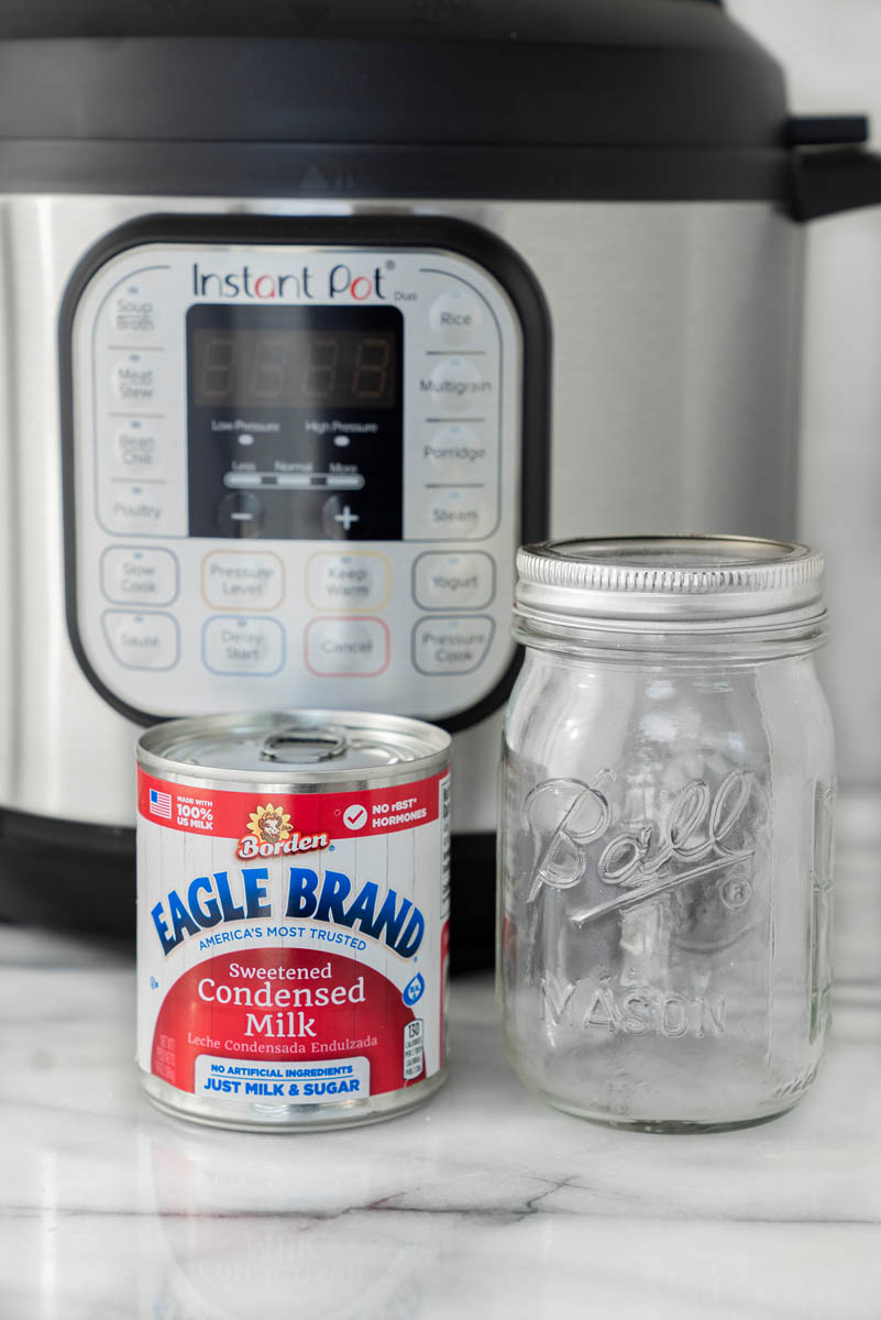 The only three items you need to make dulce de leche, sweet and condensed milk, a mason jar, and an Instant Pot.
