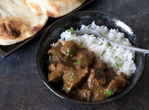 Pressure Cooker (Instant Pot) Beef Curry on a plate with rice