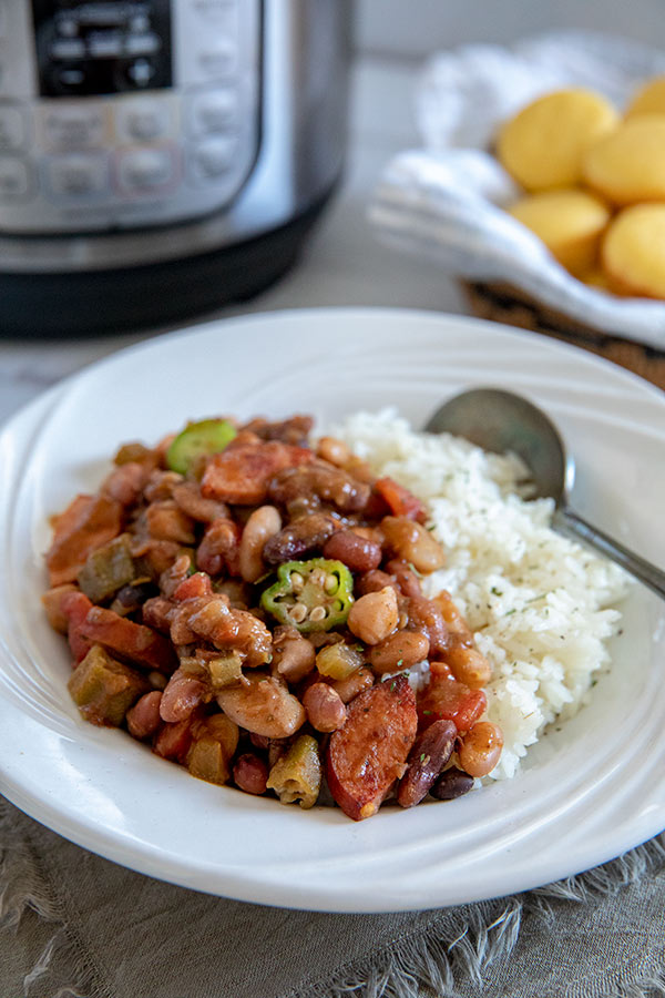 A bowl of Instant Pot Cajun 15 Bean Soup with Rice and Sausage
