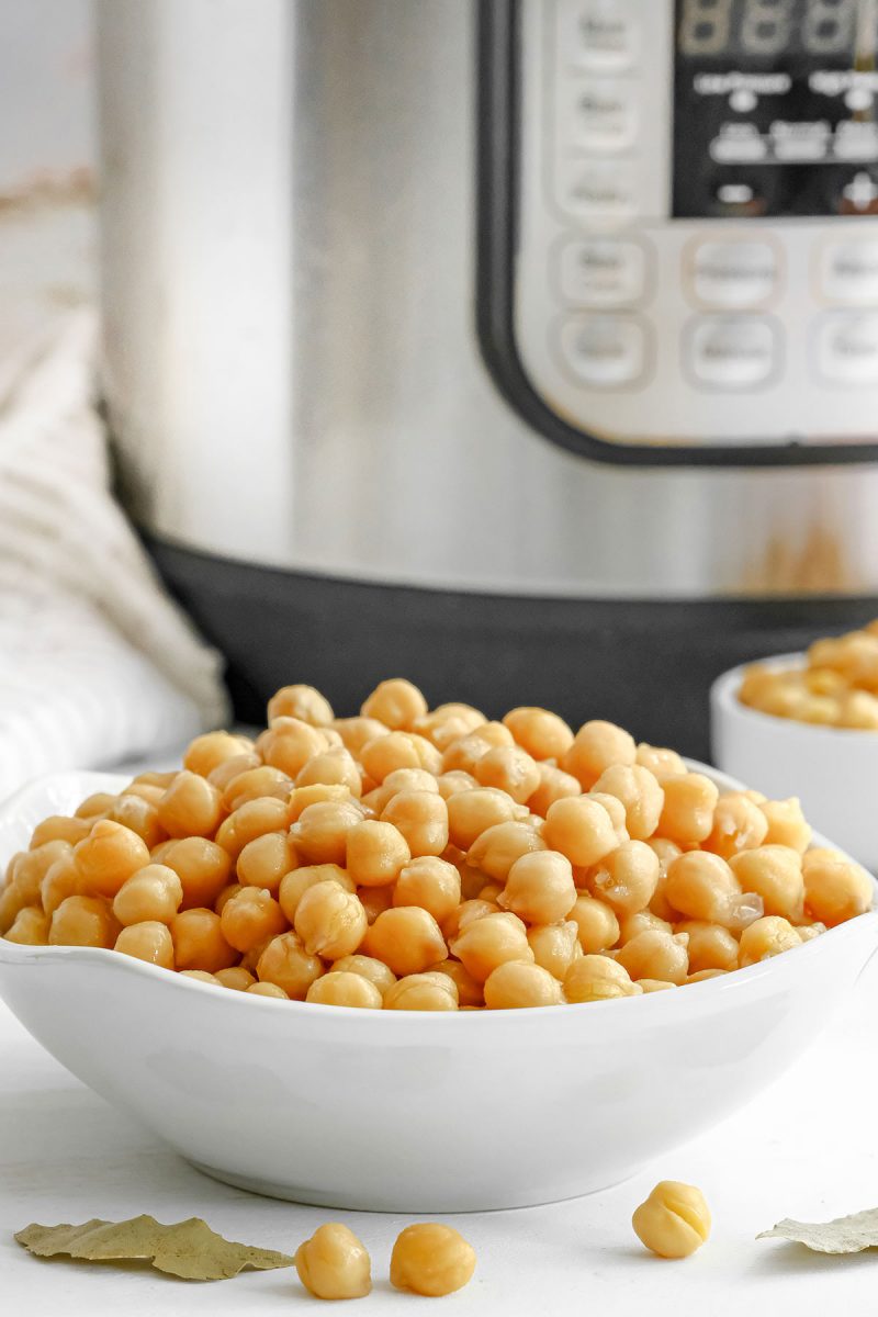 cooked chickpeas in front of an instant pot
