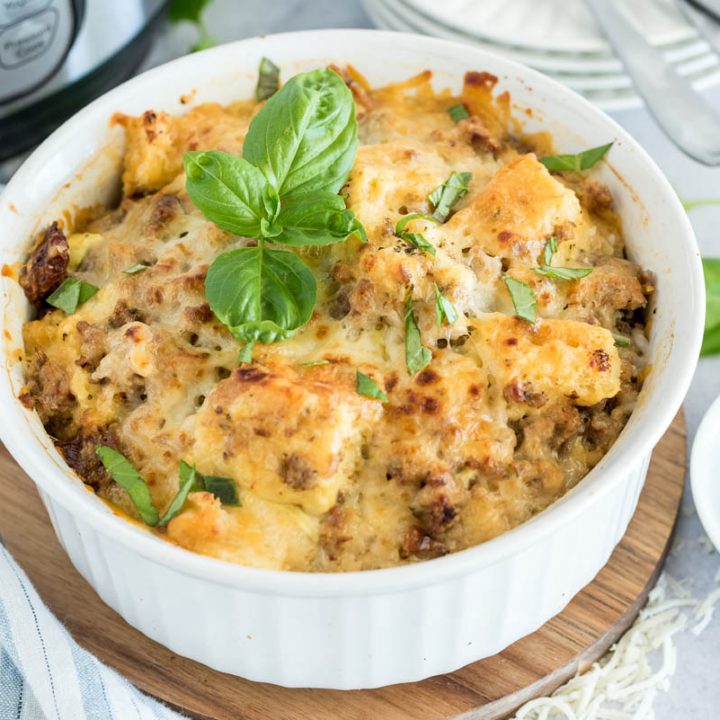 white baking dish of pressure cooked breakfast casserole with basil