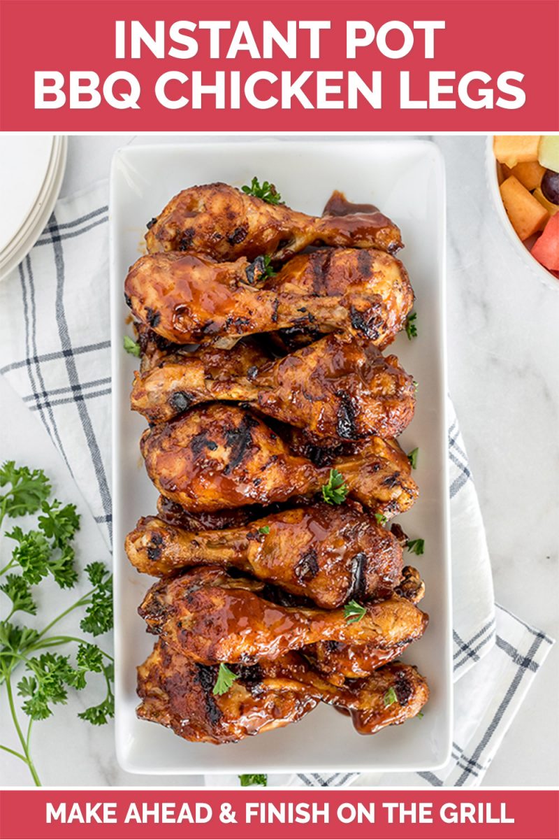 Pinterest image that reads "instant Pot BBQ Chicken Legs: Make ahead and finish on the grill" on top of an image of a white rectangular platter, with finished chicken legs set in a straight single row
