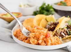 plate of instant pot spanish rice with tacos