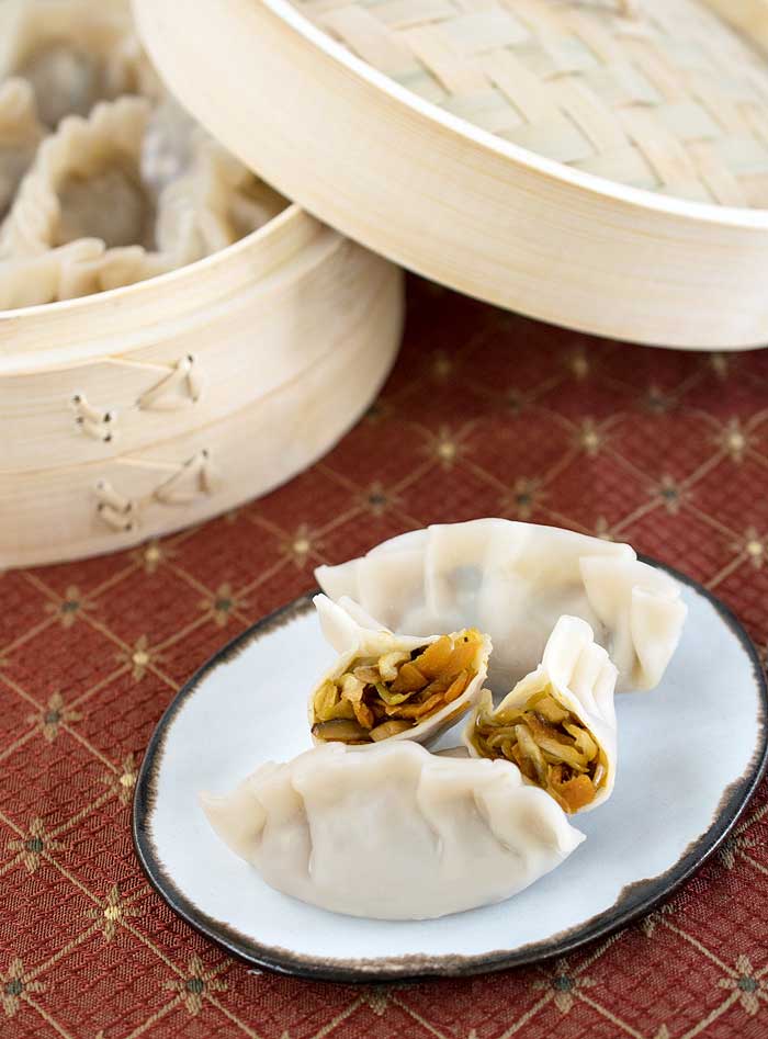 Pressure Cooker Asian Steamed Dumplings served on a white plate