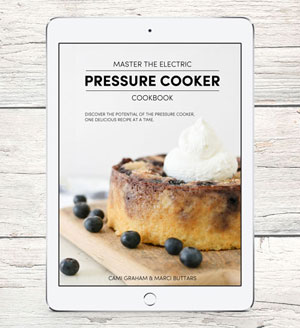 ipad with cookbook cover photo for Master the Electric Pressure Cooker Cookbook