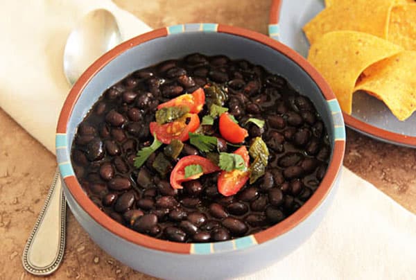  Pressure Cooker (Instant Pot) Black Beans in a white and orange bowl
