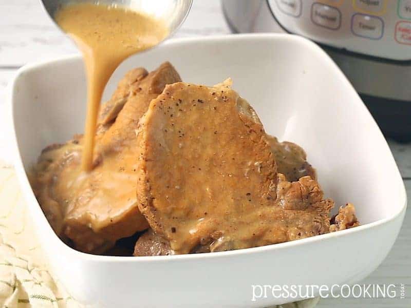 Easy Pressure Cooker Pork Chops in Mushroom Gravy - Try this old-fashioned recipe in your Instant Pot today!
