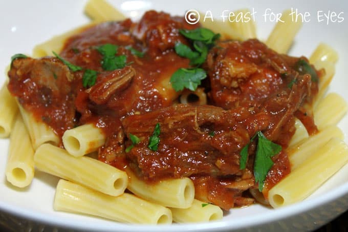 Pressure Cooker (Instant Pot) Pork Ragu Pasta Sauce with pasta on a white plate