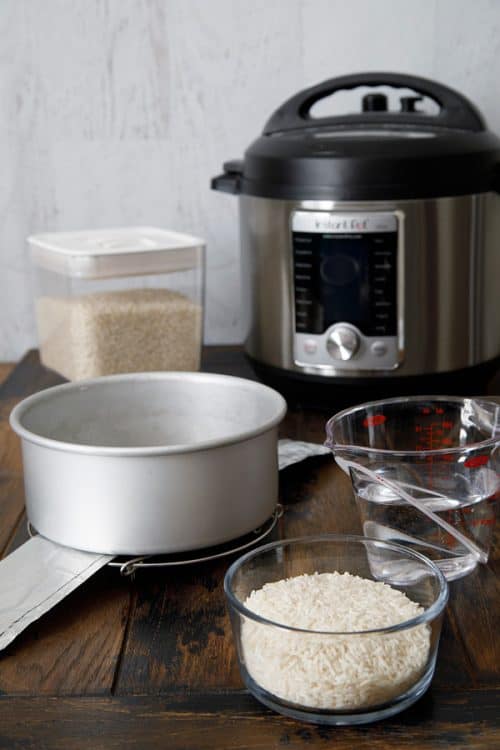 Pressure cooker accessories showing pot-in-pot-rice