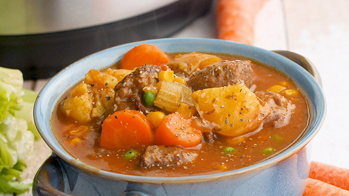 Pressure cooker beef stew in a bowl.