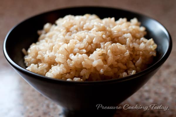 Pressure Cooker Brown Rice in a black bowl