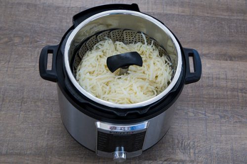 Steamer basket for making pressure cooker Hash Brown Potato Casserole.
