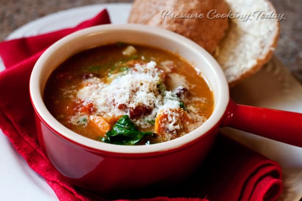 Pressure Cooker (Instant Pot) Minestrone Soup with Basil Pesto in a red bowl