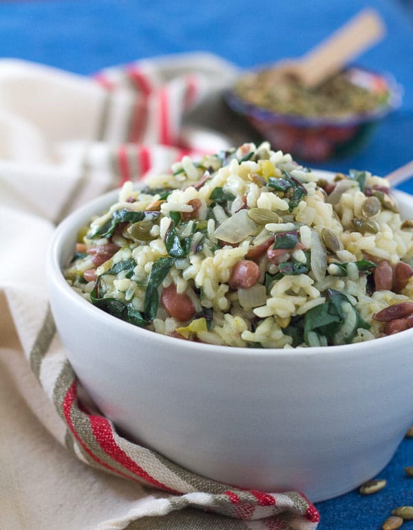 close up photo of Southwest Pinto Bean and Chard Risotto in a white bowl