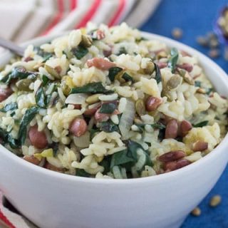Pressure Cooker (Instant Pot) Southwest Pinto Bean Chard Risotto served in a white bowl