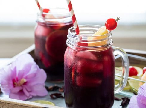 Pressure Cooker (Instant Pot) Zobo Drink - Hibiscus Tea in mason jars with straws