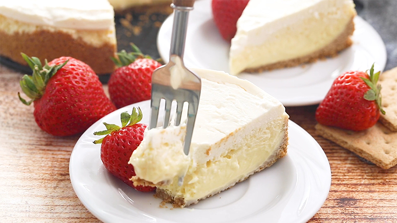 A slice of vanilla sour cream topped cheesecake aka Hollywood Two-Toned Cheesecake