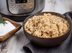 Pressure Cooker Brown Rice prepared with a dish of salt and an Instant Pot in the background