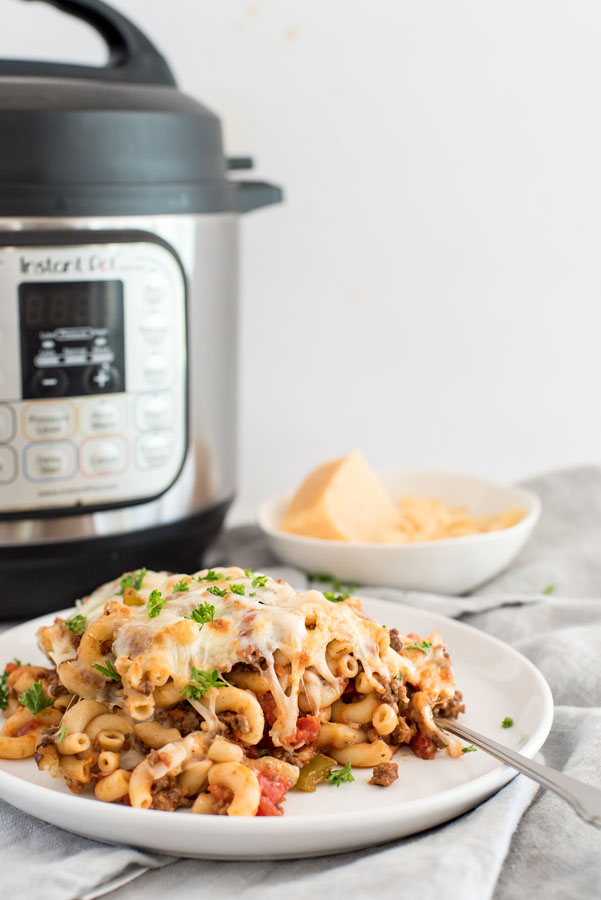 pressure cooker american chop suey / beefaroni on a table in front of an instant pot