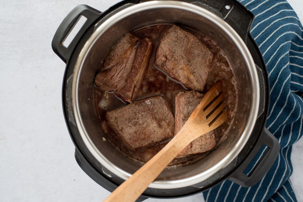 Beef Short Ribs finished cooking in an Instant Pot.
