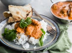 Pressure Cooker / Instant Pot Butter Chicken served on a bed of basmati rice with a side of naan
