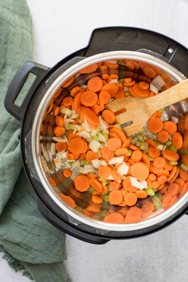 Instant pot sauteing carrots, celery, and onion when making pressure cooker chicken noodle soup.
