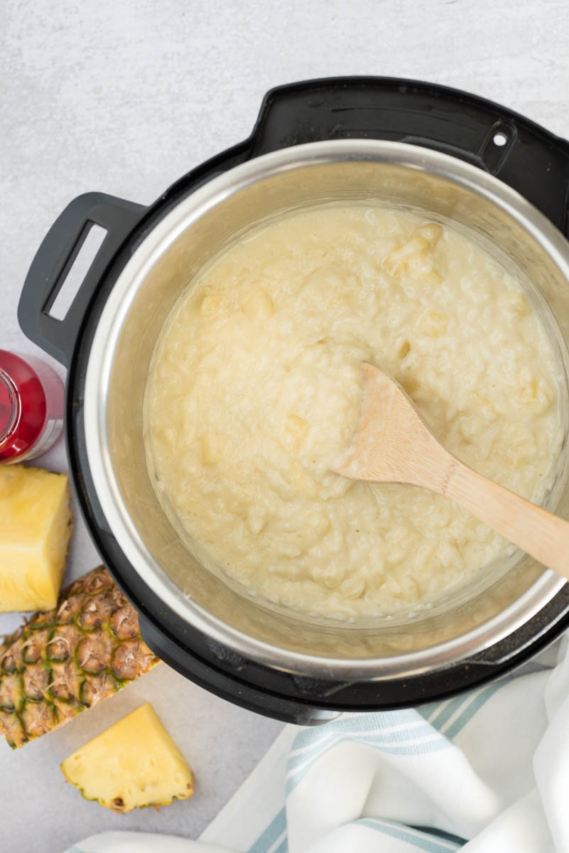 overhead of an instant pot with creamy coconut arborio rice