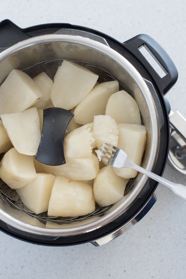 You can tell when potatoes are done when a fork can easily pierce the potato. Step 3 of Instant Pot Mashed Potatoes