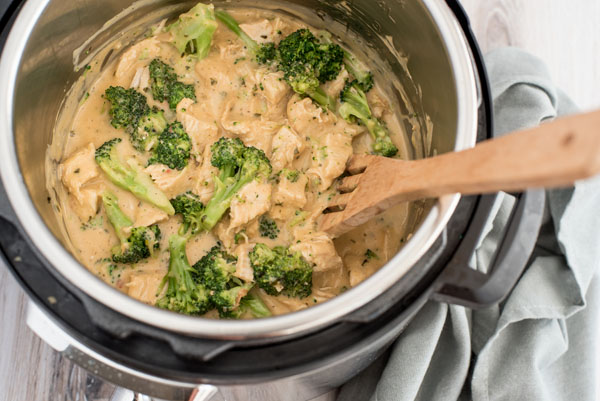 Instant Pot Cheesy Chicken and Broccoli inside the pressure cooker pot