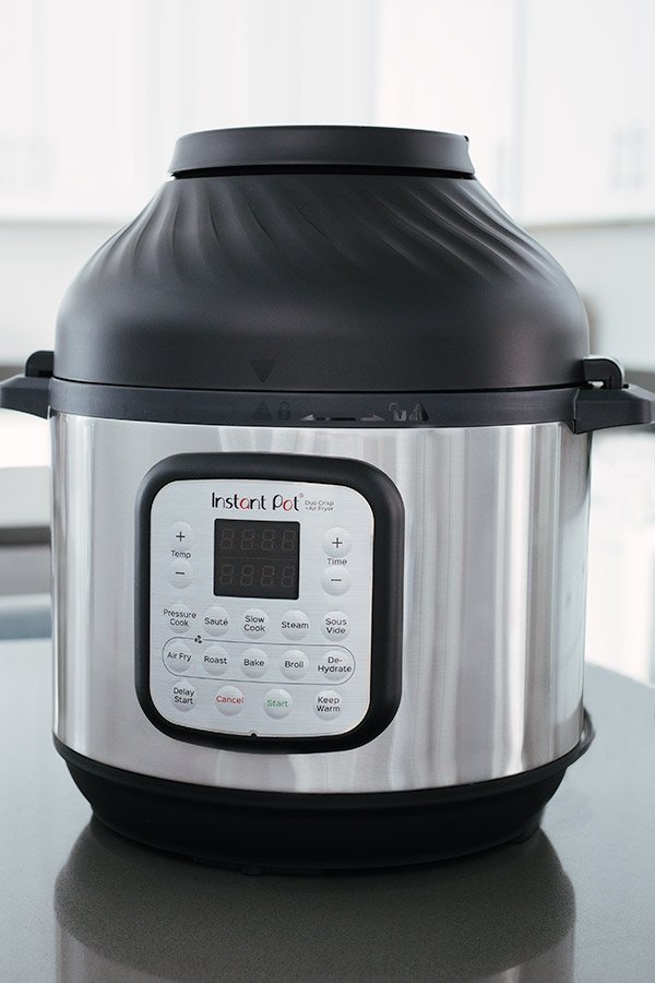 Instant Pot Duo Crisp with Air Fryer lid placed on top.