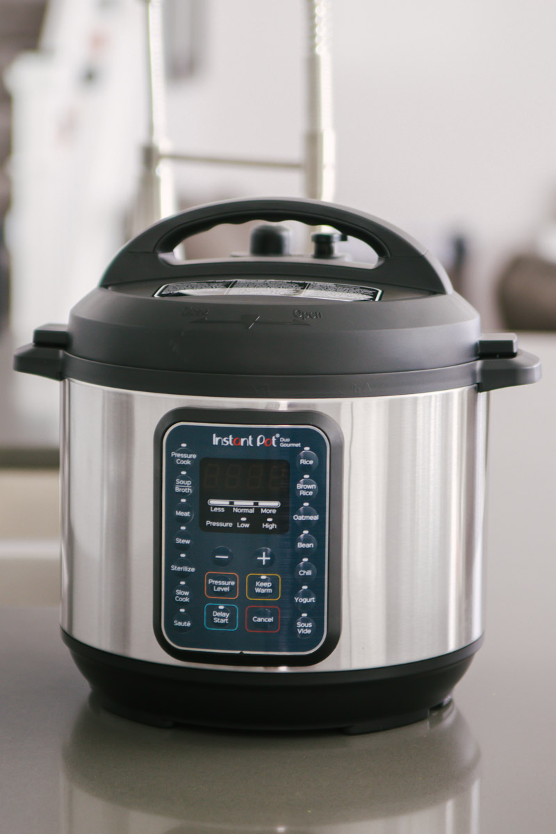 direct front close up of the Instant Pot Duo Gourmet on a gray countertop