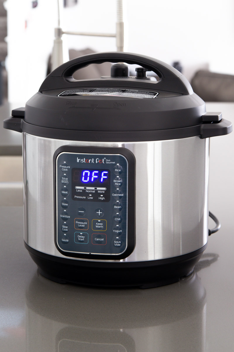 direct front shot of the Instant Pot Duo Gourmet with the blue light LED screen reading "OFF"