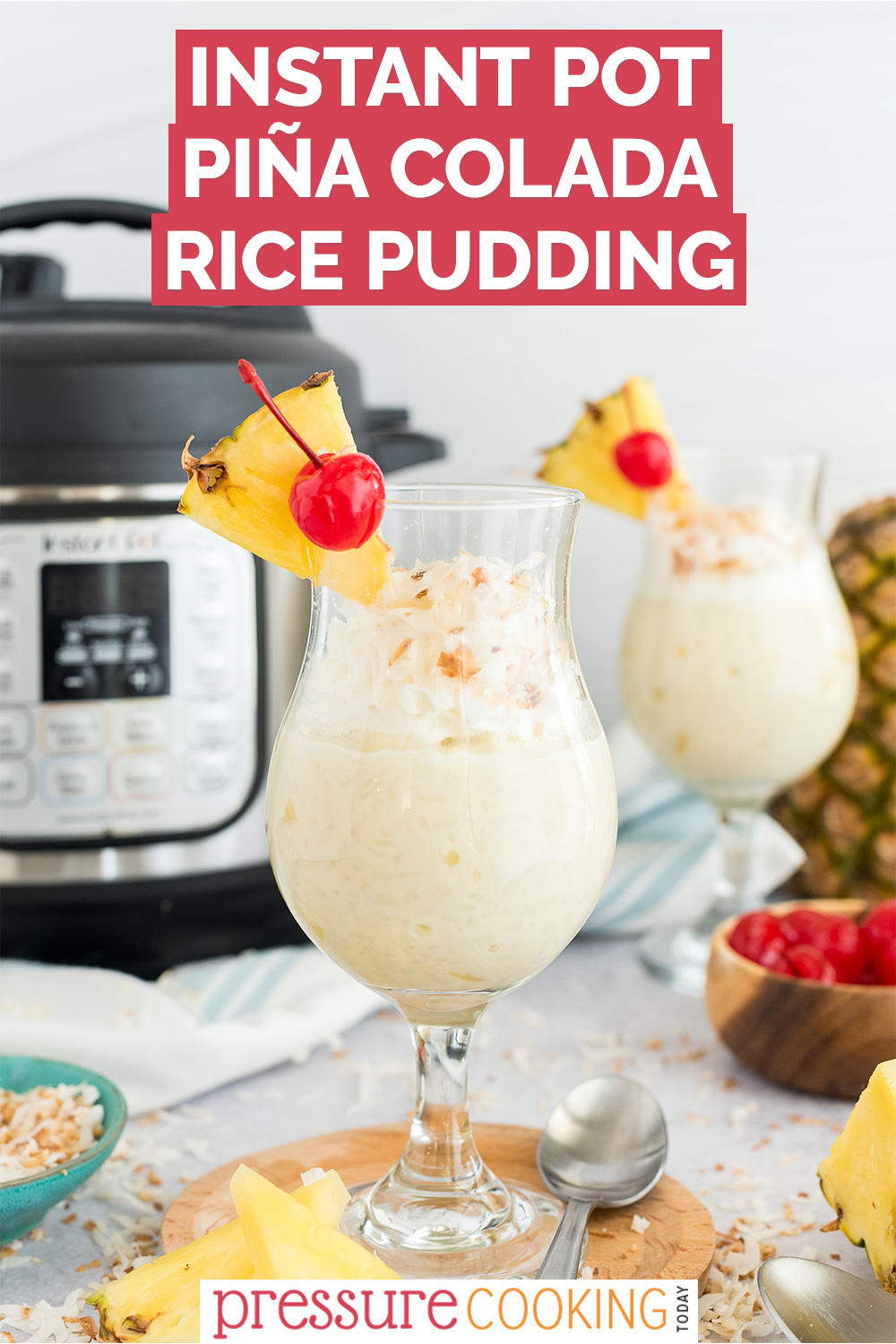Pinterest image that reads Instant Pot Pina Colada Rice Pudding, overlaid on a photo of rice pudding served in a pina colada class, garnished with coconut, cherry, and pineapple via @PressureCook2da