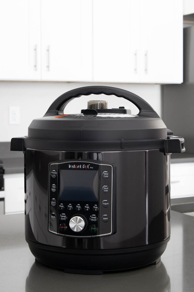 A close-up of the display of the black stainless steel Instant Pot Pro